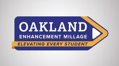 Logo for the Oakland Enhancement Millage campaign, styled as an arrow/pencil shape in navy and gold, reading "Oakland Enhancement Millage: Elevating Every Student."
