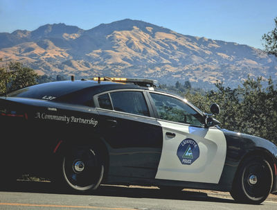 Lafayette police car on the road.