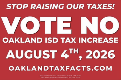 A red campaign sign reading "Stop raising our taxes! Vote no Oakland ISD tax increase, August 4th, 2026," with the website oaklandtaxfacts.com and a disclosure that it's paid for by the Oakland County Republican Party.