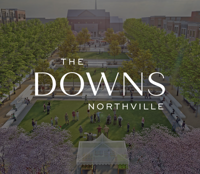 Rendering of The Downs Northville development, showing a landscaped pedestrian plaza lined with trees, cherry blossoms, and people, with brick buildings in the background.