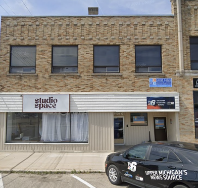 Exterior of the brick building housing Great Lakes Recovery Centers' outpatient clinic in Escanaba.